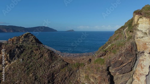 Wooden Walkways At The Hiking Route Of Punta de Fuciño do Porco In O Vicedo, In The Province Of Lugo, Galicia, Spain. Aerial Drone Shot