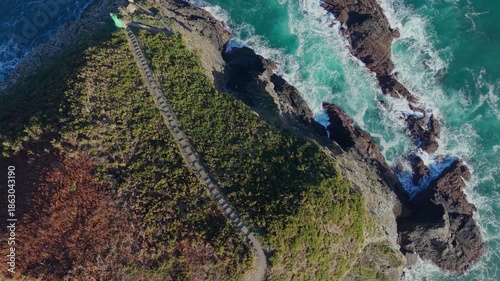 Dramatic Coastal Walkways At Punta de Fuciño do Porco Hiking Route In O Vicedo, Province Of Lugo, Galicia, Spain. Aerial Topdown Shot