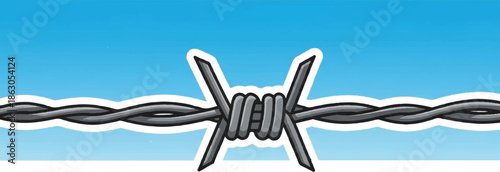 Barbed wire fence crossing a bright blue sky