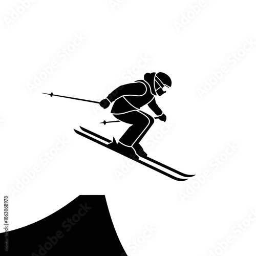 Skier in mid air skiing down.