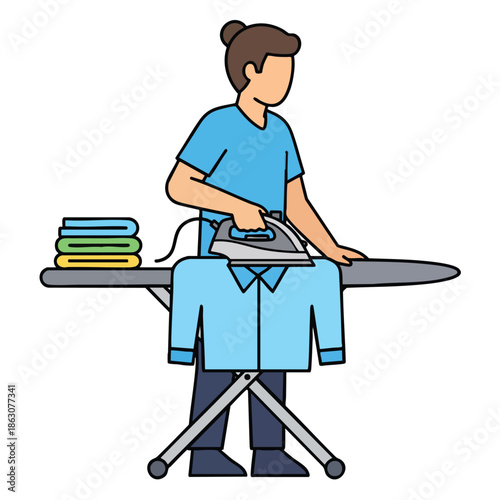 A person with a bun irons a shirt on a board with folded items nearby