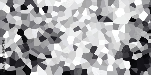Monochromatic abstract mosaic with irregular polygons in shades of grey and white, offering a textured and versatile background for graphic design and digital art