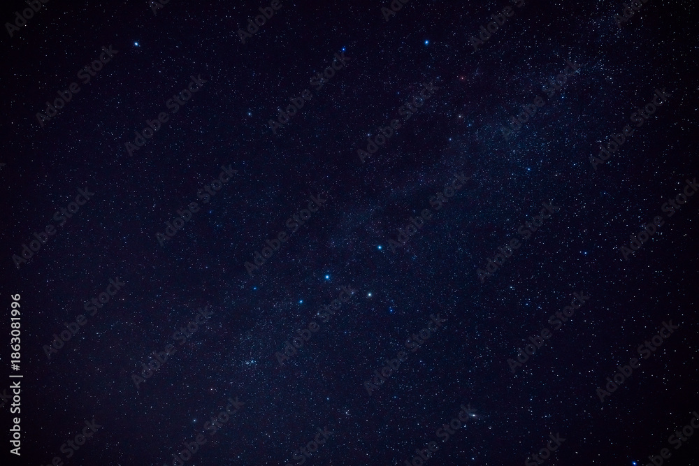 Fototapeta premium Milky way stars and constellations with a galaxy background.