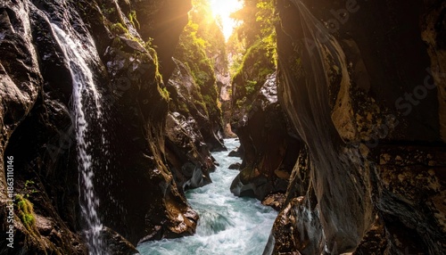Sunlight Streams Through a Lush Green Canyon with a Rushing River.