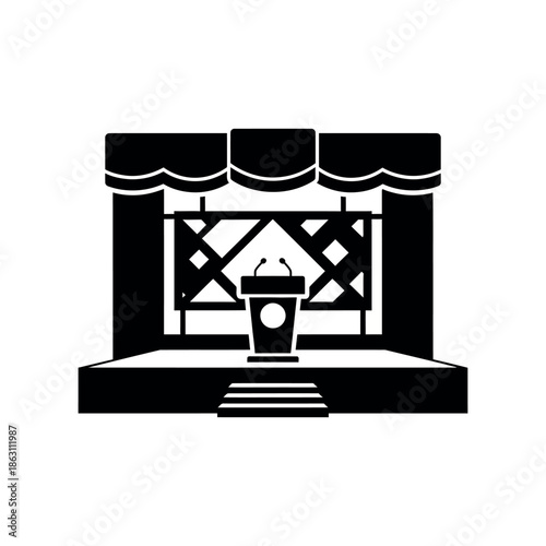 Stage podium with microphones and backdrop.