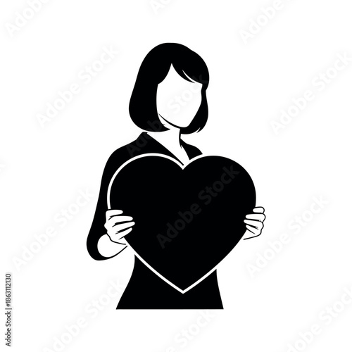Woman holding a heart shape in black and white.
