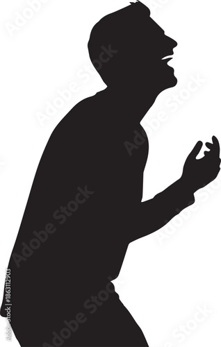 Silhouette of a man in prayer