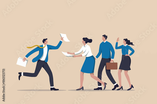 Business team collaborating and rushing through tasks with documents in a busy office environment