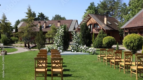 Wooden chairs standing outside on a wedding