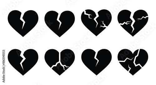 A collection of black heart shapes some whole and some broken displayed neatly