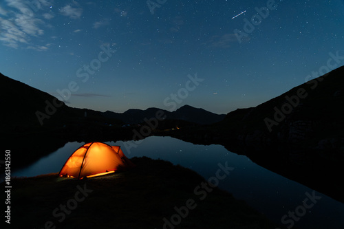 Camping in the Carpathian Mountains of Romania with a clear sky with the Milky Way