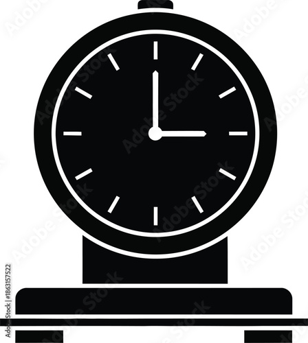 A black silhouette icon of a vintage desk clock against a white background
