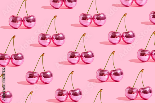 Seamless candy pink background with disco cherries pattern