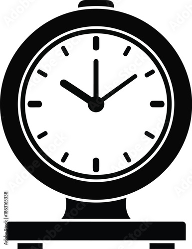 A simple black and white icon illustration of an analog alarm clock