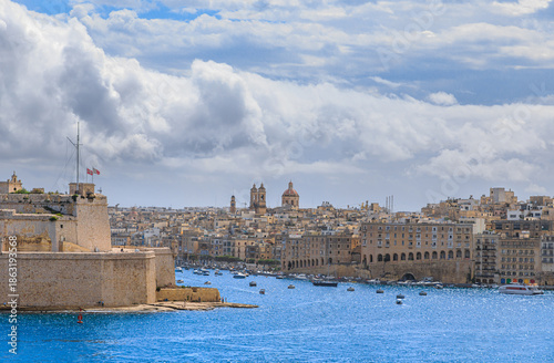 Glimpse of Fort St. Angelo and Senglea waterfront in Malta Island.