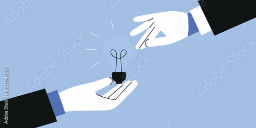 Sharing an idea hands exchanging a glowing light bulb concept