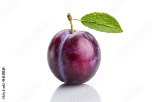 Single plum with green leaf isolated on white background
