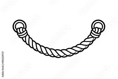 Curved rope with rings on a brown background
