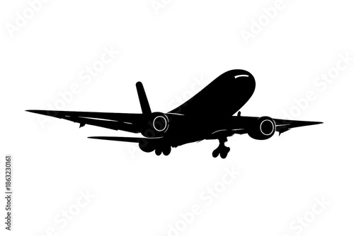Silhouette of a passenger airplane taking off or landing