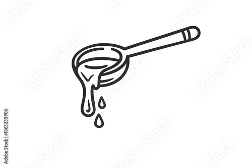 Spoon with dripping liquid