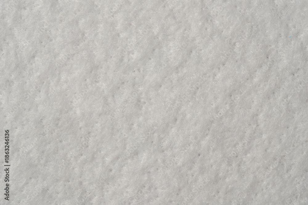 Obraz premium White textured surface resembling soft fabric material