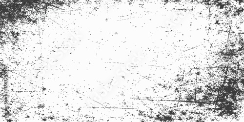 Vintage black and white abstract grunge background featuring an artistic paint splash pattern with a dirty ink splatter texture and a weathered brush stroke border illustration on old paper