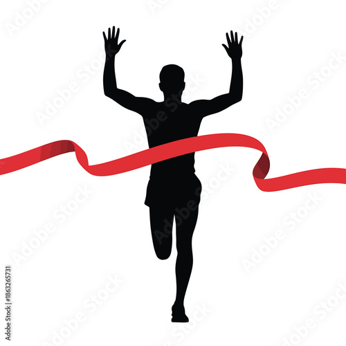 Silhouette of a runner breaking through a red finish line ribbon