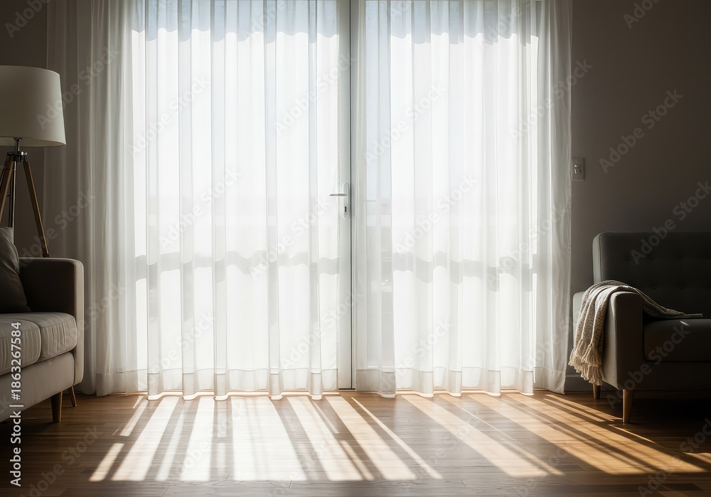Fototapeta premium Bright morning sunlight streams through sheer white curtains into a minimalist living space, casting long diagonal shadows across the wooden floor ,home ,modern ,light beam