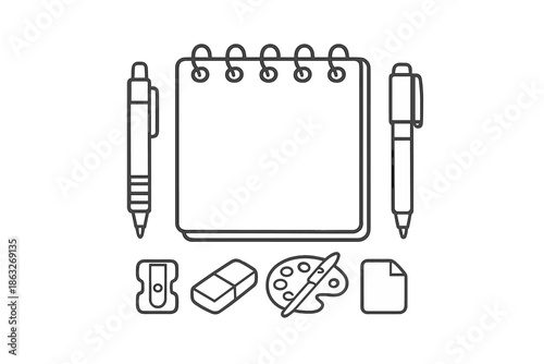 Stationery and art supplies on a gray background
