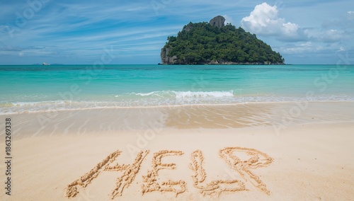 Message Written in Sand Asking for Help on a Beach Near a Small Island