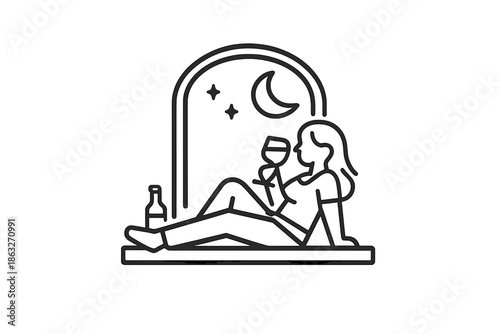 Woman enjoying wine by the window at night