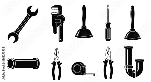 A collection of various hand tools including wrenches pliers and measuring tape