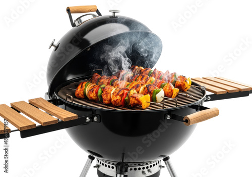 matte black kettle barbecue grill displaying sizzling chicken and pepper skewers, isolated on a bright white studio background, commercial food advertising concept