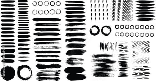 A collection of various black ink brush strokes and patterns on a white background