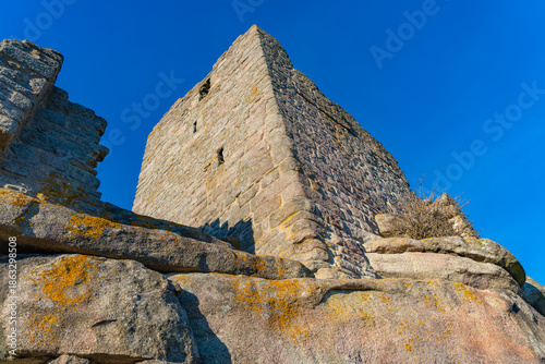 The medieval castle. The ruins of the castle on a winter evening? at sunset.