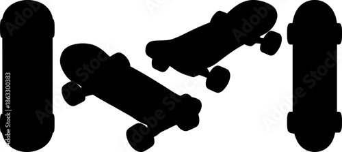 Set of black silhouettes of skateboards shown from different perspectives, including top view and 3D angles.