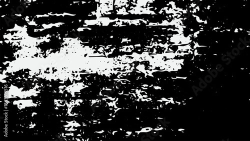 Abstract black and white grunge texture with high contrast distressed noise and grainy splatter.