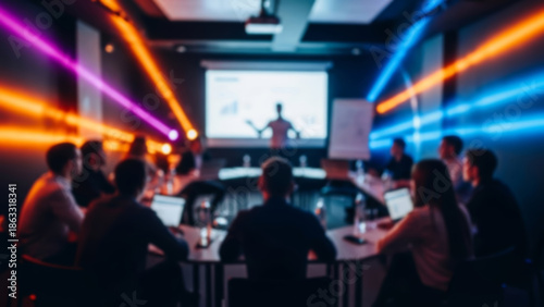 Blurred business training session with vibrant lighting effects. Professional development and learning theme.