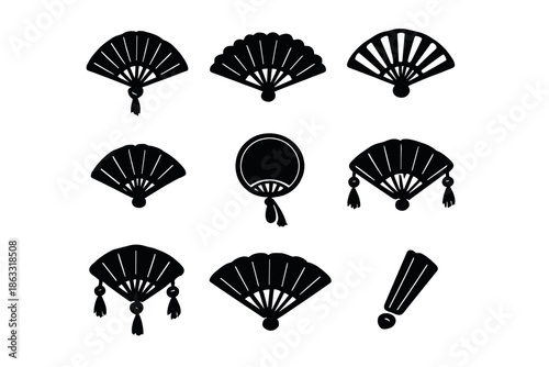 Collection of Black Japanese Folding Fans on Dark Background