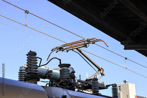 Pantograph of an electric train connecting the train to the overhead catenary wire.	