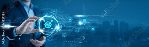 Bild auf Leinwand Businessman holding a system integration icon in his hand connected platforms, e