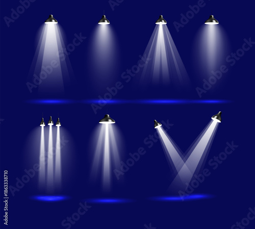 Spotlight Brilliance: A collection of spotlights illuminate the scene, casting dynamic beams of light against a deep blue backdrop, creating a visually striking and engaging effect.