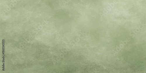 Aged green grunge background with a vintage parchment texture and rough antique paper surface featuring a dirty textured pattern for an art backdrop