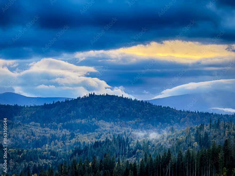 Fototapeta premium Sunny Autumn Carpathians with Puffy White During The Sunset