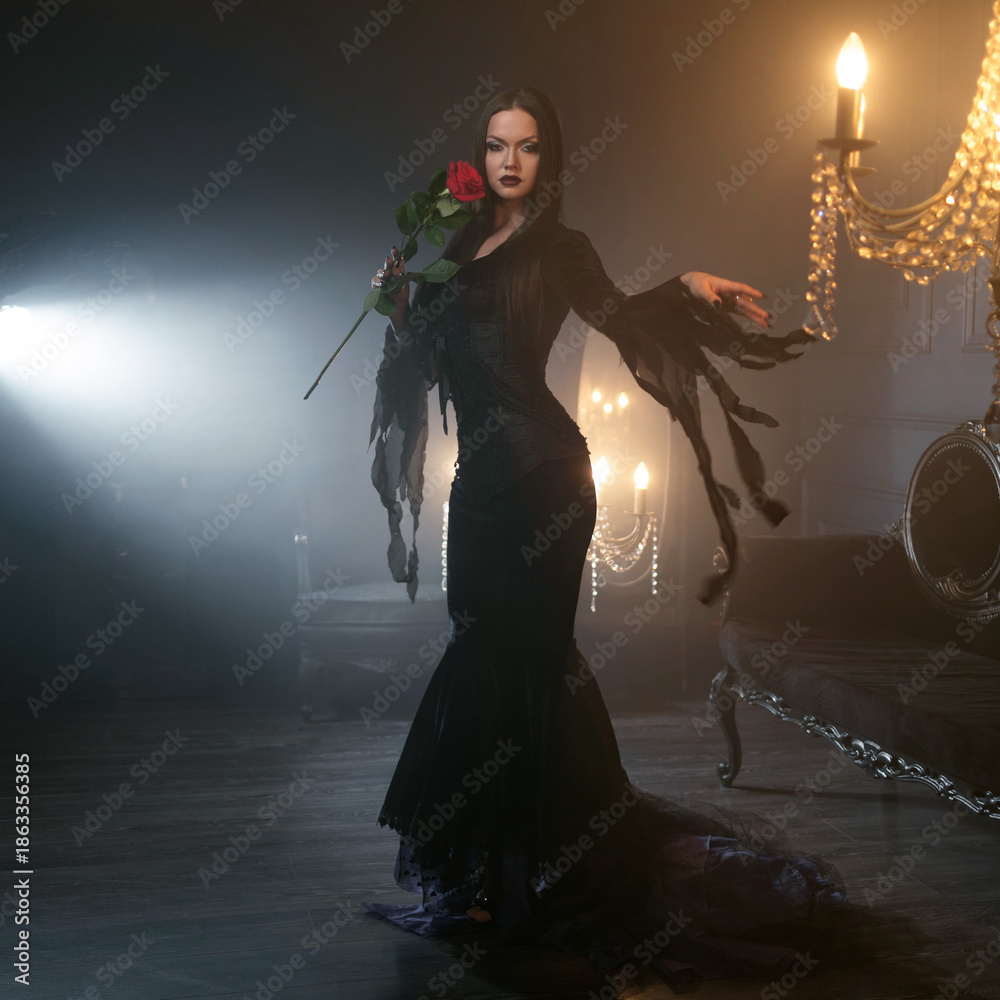 Φωτογραφία Gothic femme fatale portrait featuring a woman in black godet dress with corseted waist, long straight hair, and dramatic makeup in opulent dimly lit gothic surroundings