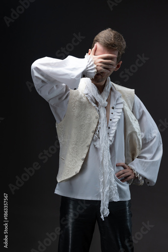 Canvastavla A young man in an early Baroque outfit, a white blouse with lace and ruffles, a