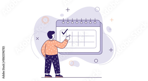 Man marking a date on a calendar planning and scheduling important events.