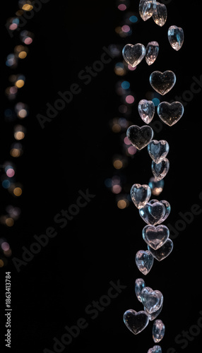 Abstract Heart Bubbles Cascade – Sparkling Romance Against Dark Backdrop Perfect for Valentine’s Day, Love Themes, Artistic Design, and Social Media Content