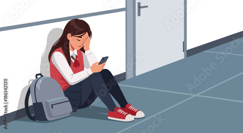 A young student sits alone looking distressed while holding a phone, possibly experiencing bullying or sadness