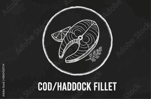 Cod/haddock fillet garnished with lemon on a chalkboard background